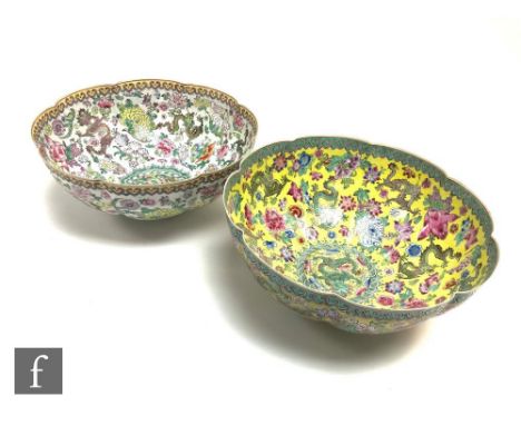 Two Chinese eggshell porcelain bowls, each of scalloped lotus form, each similarly decorated with five-clawed dragons amongst