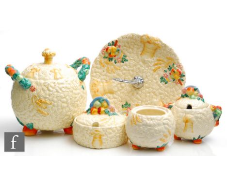 A small collection of Clarice Cliff Newport pottery, comprising cake plate, biscuit barrel, two lidded preserve pots and a tw