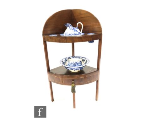 A George IV mahogany corner wash stand, with later Spode Italian pattern blue and white transfer printed bowl and Minton blue