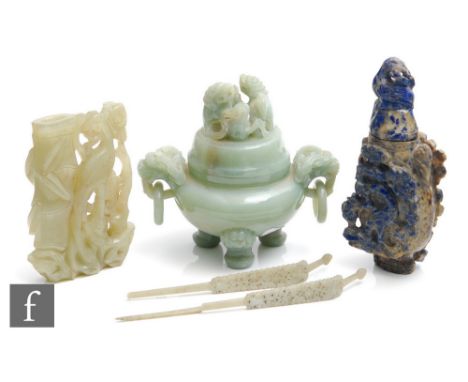 A collection of Chinese late Qing Dynasty (1644-1912) hardstone carvings, to include two green hardstone hair ornaments, one 