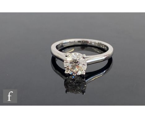 A platinum diamond solitaire ring, brilliant cut claw set stones weight 1.21ct, colour J/K, clarity SI1, to a plain shank, we