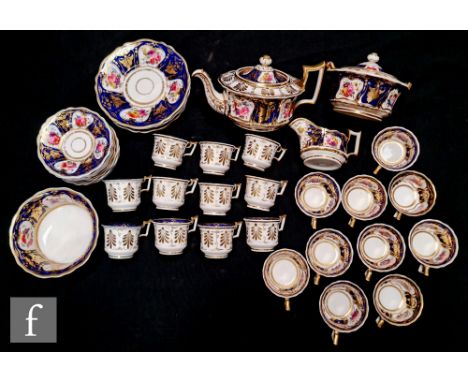 A 19th Century Ridgeway teaset comprising a teapot, a sucrier, a slop bowl, four stand dishes, a milk jug, eleven tea cups, t