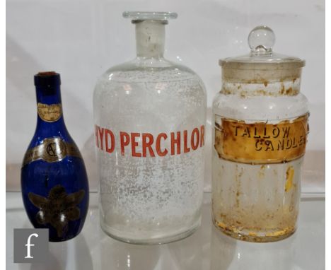 A large clear glass apothecary flask and stopper titled HYD PERCHLOR, height 28cm, another for TALLOW CANDLES, height 25cm an