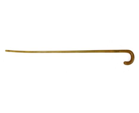 A Chinese horn walking stick, 19th century, with a crook handle and a metal ferrule, 90cm long, overall weight 344g This lot 