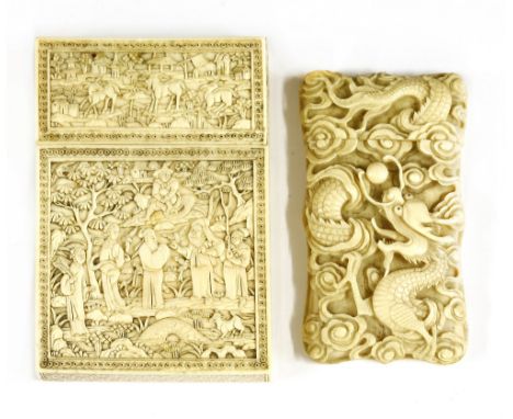 Two Chinese Canton ivory card cases, 19th century, one of rectangular form, carved with figures in a landscape with trees, ro