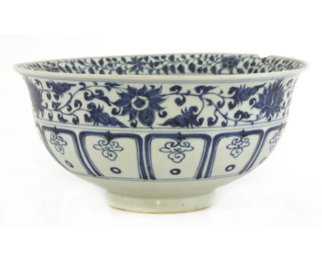 A large Chinese blue and white bowl, of circular form on a short circular foot with flared mouth, painted in the Yuan style, 