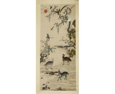 A Chinese embroidered kesi hanging scroll , with three rams on a grass, pheasants, magpies and other birds standing on a blos