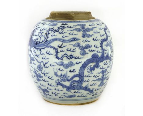 A Chinese blue and white ginger jar, 18th century, painted with phoenixes and dragons amongst clouds, 22.5cm high 清十八世纪 青花龙凤纹