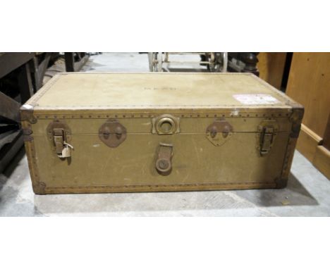 Vintage trunk, metal bound with canvas, Union Castle label and the initials 'MEAD' stamped on front, with leather carrying ha