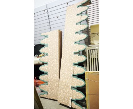 Two pelmets upholstered in scrolling foliate brown and cream fabric (one 220cm wide approx., the other 155cm approx.) with ma