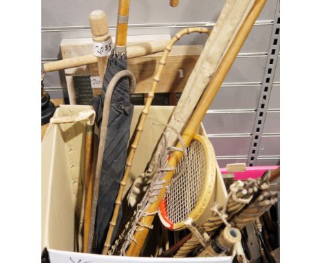 Two vintage washboards, three rug-beaters, a vintage lacrosse stick, and other items