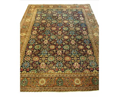 PERSIAN TABRIZ CARPET, 331cm x 251cm, of multiple medallions on sapphire field.