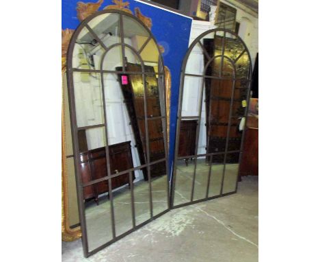 ARCHITECTURAL STYLE MIRRORS, a pair, metal framed of large proportions, each with an arched top, 109cm W x 206cm H. (2)