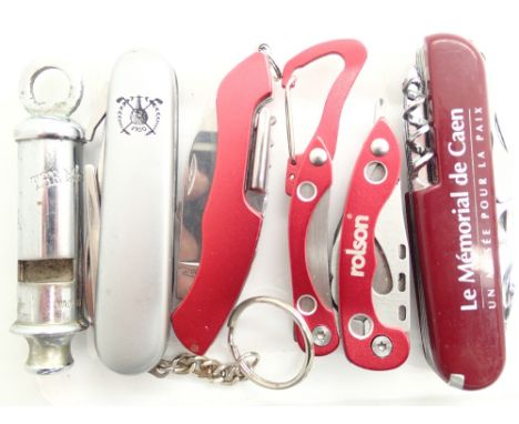Four multi tool knives and a Metropolitan whistle 