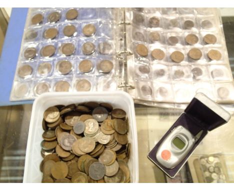 Quantity of mixed coinage including a folder containing British copper, mainly pennies and a vintage Samsung phone 