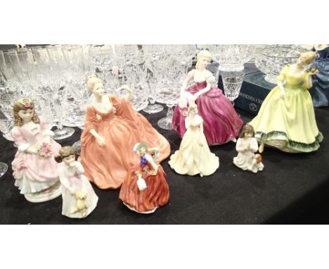 Eight Royal Doulton figurines, all first quality 