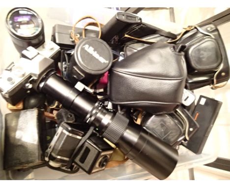 Mixed camera lot, mostly film cameras and lenses to include Olympus, Praktica and Ricoh 