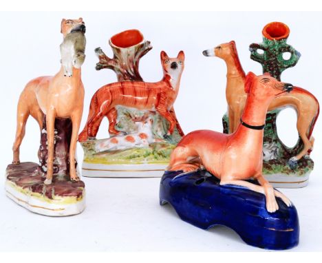 GREYHOUNDS: Four Staffordshire Pottery Portrait Figures, including a spill vase modelled with a Fox and Lamb,  also a Standin