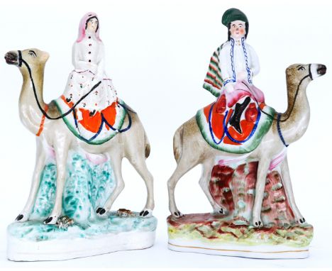 HISTORICAL: A rare pair of Staffordshire Pottery Camel Riders: Sir Richard & Lady Isobel Burton, circa 1861,  each riding a c
