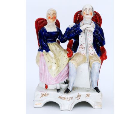 HISTORICAL: A Staffordshire Pottery Flatback Group, modelled as 'John Anderson & My Jo', mid 19th century,  a seated couple, 