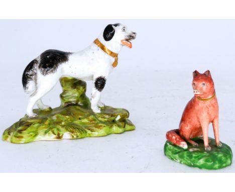 DOGS: Two small Staffordshire Figures, modelled as a Newfoundland or Hunting Dog; and a Red Fox, mid 19th century,  the newfo