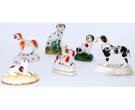 DOGS: Six assorted small Staffordshire models of dogs, including a rare Spaniel Lying on a mound, by Samuel Alcock,  the brow