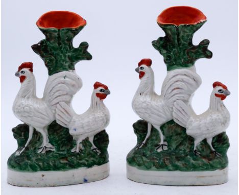 ANIMALS: An excellent pair of Staffordshire Pottery Flatback Spill Vases, each modelled as a Cockerel and Hen, mid 19th centu