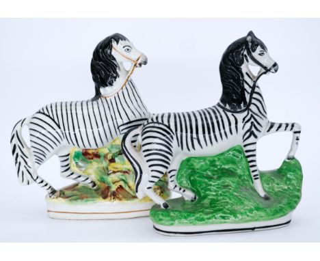 ZEBRAS: Six assorted Staffordshire Pottery Flatbacks of Zebras, including a matched pair, both being assailed by snakes, mid 