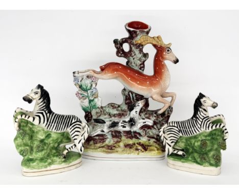 ANIMALS: Three Staffordshire Pottery Flatbacks, including ' Dog Chasing a Deer,  the buck leaping to the right, with a black 