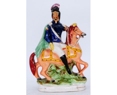 HISTORICAL: A Staffordshire Pottery Portrait Figure, modelled as Emperor Napoleon III, mid 19th century,  Louis Napoleon in u