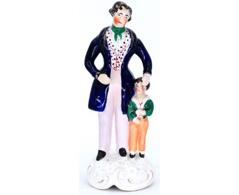 HISTORICAL: A Staffordshire Pottery Portrait Figure of Anthony Ashley Cooper, 7th Earl of Shaftesbury, with a child, circa 18