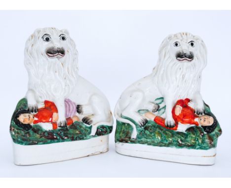 LIONS: A rare and unusual pair of Staffordshire Flatback Figures, modelled as the British Lion and Napoleon III, circa 1860, 