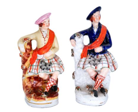 SCOTTISH: Two Staffordshire Pottery figures of Highlanders, circa 1860, possibly the Parr Factory,  each decorated in colours