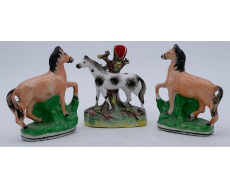 ANIMALS: Three Staffordshire Pottery Horses, including a pair and a single Piebald horse,  the Piebald standing before a holl
