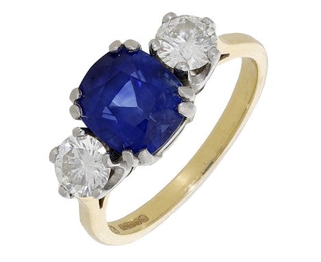 A sapphire and diamond three stone ring, the cushion-shaped sapphire between brilliant-cut diamond shoulders, mounted in 18ct