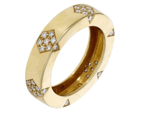 A diamond ring, the polished band interspersed with lozenge-shaped clusters set with brilliant-cut diamonds, stamped ‘750’, t