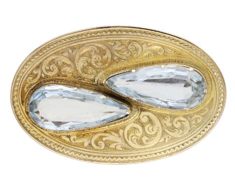 A late 19th century aquamarine brooch, with engraved decoration throughout and set with two pear-shaped aquamarines in raised