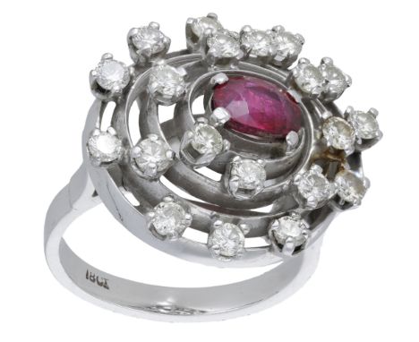 A ruby and diamond cluster ring, attributed to Alan Gard, circa 1970, of whorl design, the knifewire mount set throughout wit