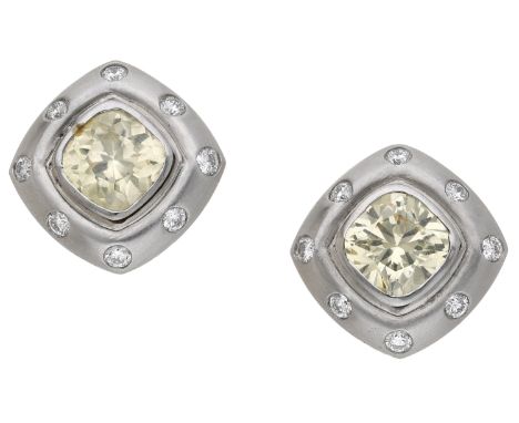 A pair of diamond and paste ear clips, each clip comprising a cushion-shaped yellow paste within a surround of bezel-set bril