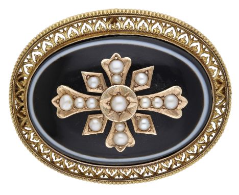 A late 19th century onyx memorial brooch, the oval-shaped brooch set with a banded onyx cabochon, centred with an applied gol