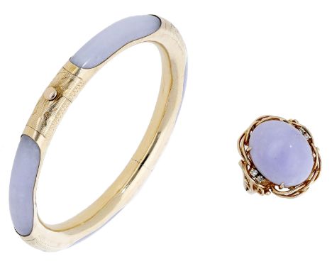 A lavender jade bangle and dress ring, the hinged bangle mounted in gold with engraved decoration and spaced by sections of p