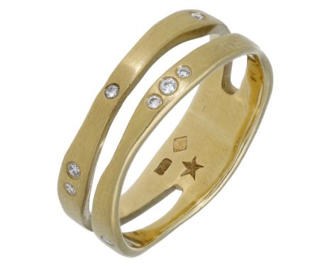 A diamond ring by H. Stern, the bifurcated ring with a satin finish and spaced with brilliant-cut diamond highlights, maker’s