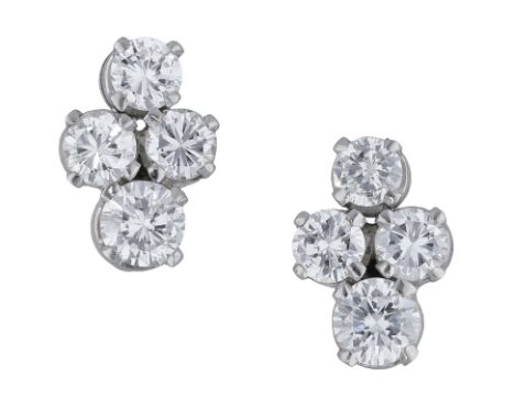 A pair of diamond cluster ear studs, each set with a quatrefoil of four brilliant-cut diamonds, total diamond weight approxim