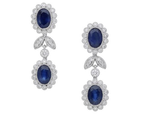 A pair of sapphire and diamond ear pendants, designed as two oval mixed-cut sapphire and brilliant-cut diamond clusters, with