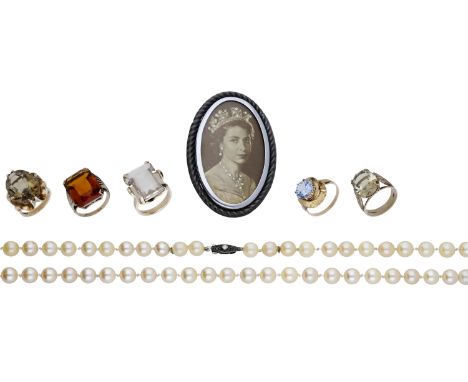 A collection of jewellery, comprising a cultured pearl necklace, five gem-set rings and a brooch with photograph portrait of 