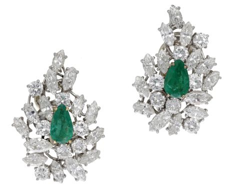 A pair of emerald and diamond ear clips, each set with a pear-shaped emerald, within a stepped cluster surround set with bril