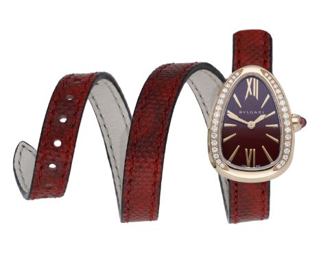 Bulgari. A lady’s pink gold and diamond-set wristwatch, Serpenti, circa 2022. Movement: quartz. Dial: burgundy enamel over en