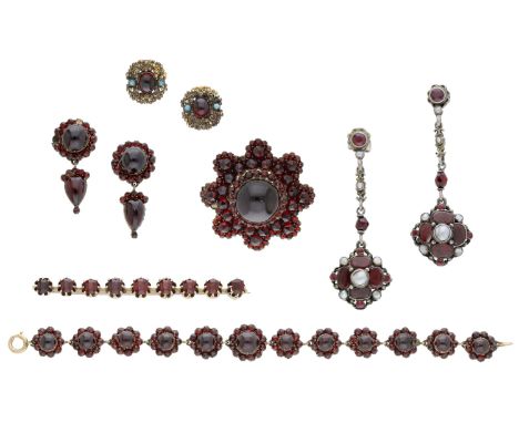 A small collection of garnet and gem-set jewellery, comprising two brooches, a bracelet and three pairs of earrings, two pair