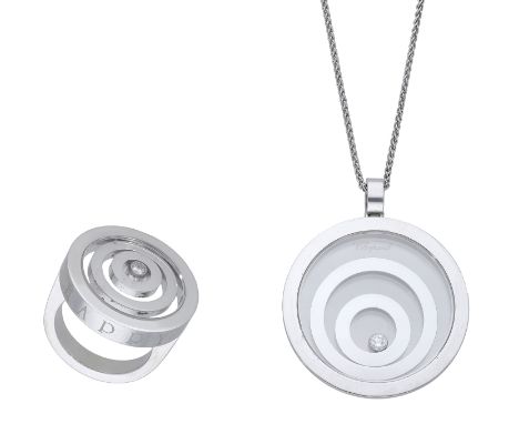 A diamond ‘Happy Spirit’ pendant and ring by Chopard, each designed as a series of concentric circles beneath a glazed compar