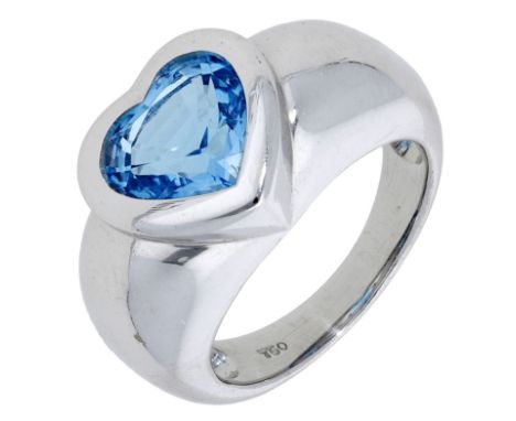 A blue topaz ring, the heart-shaped blue topaz in a rubover setting on a tapered band, stamped ‘750’, ring size N. £300-£500 